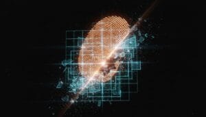 A glowing fingerprint is overlaid on a digital grid, with the image appearing to shatter and break apart diagonally.