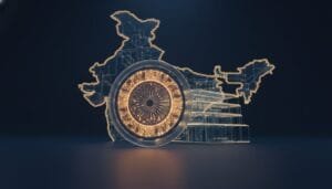 A glowing digital wheel resembling the Ashoka Chakra is displayed in front of an outlined map of India on a dark background.